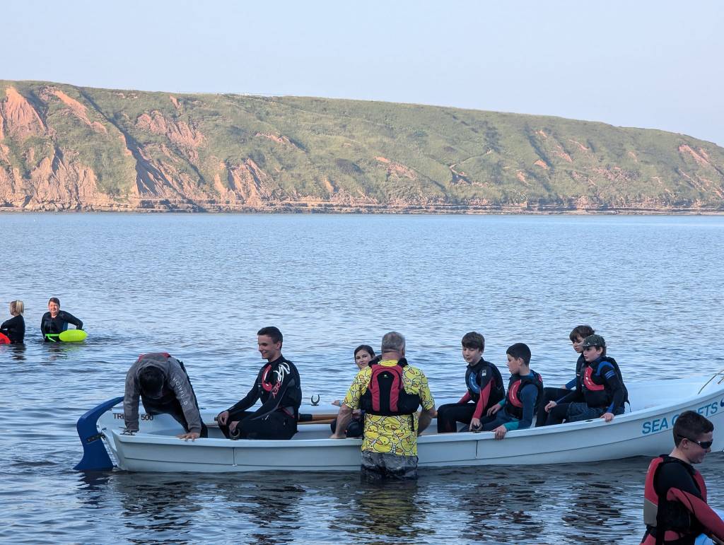 Photograph of Sea Cadets from Filey and Bridlington rowing in Filey Bay.