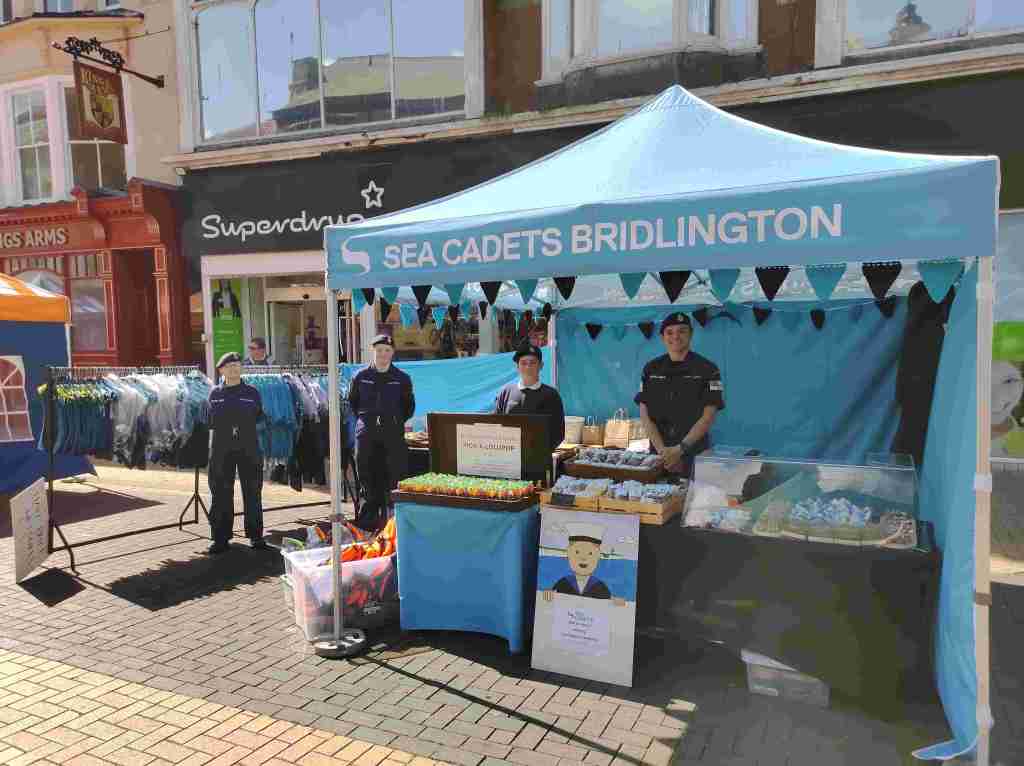 Photo of Sea Cadets manning the stall